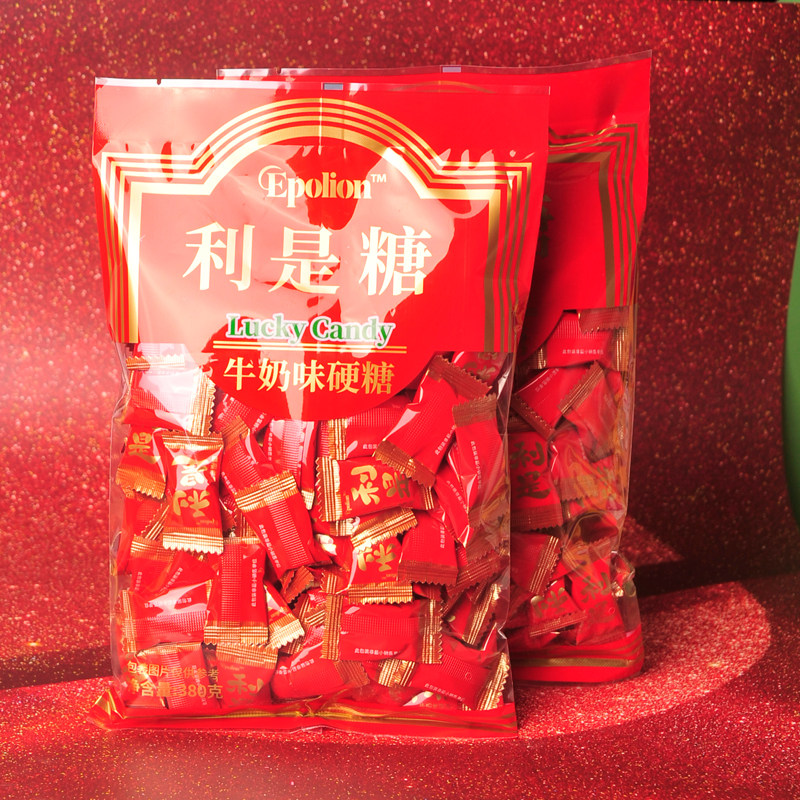 年货利是糖牛奶味硬糖新年喜庆糖果红色包装高端轻奢过年招待糖