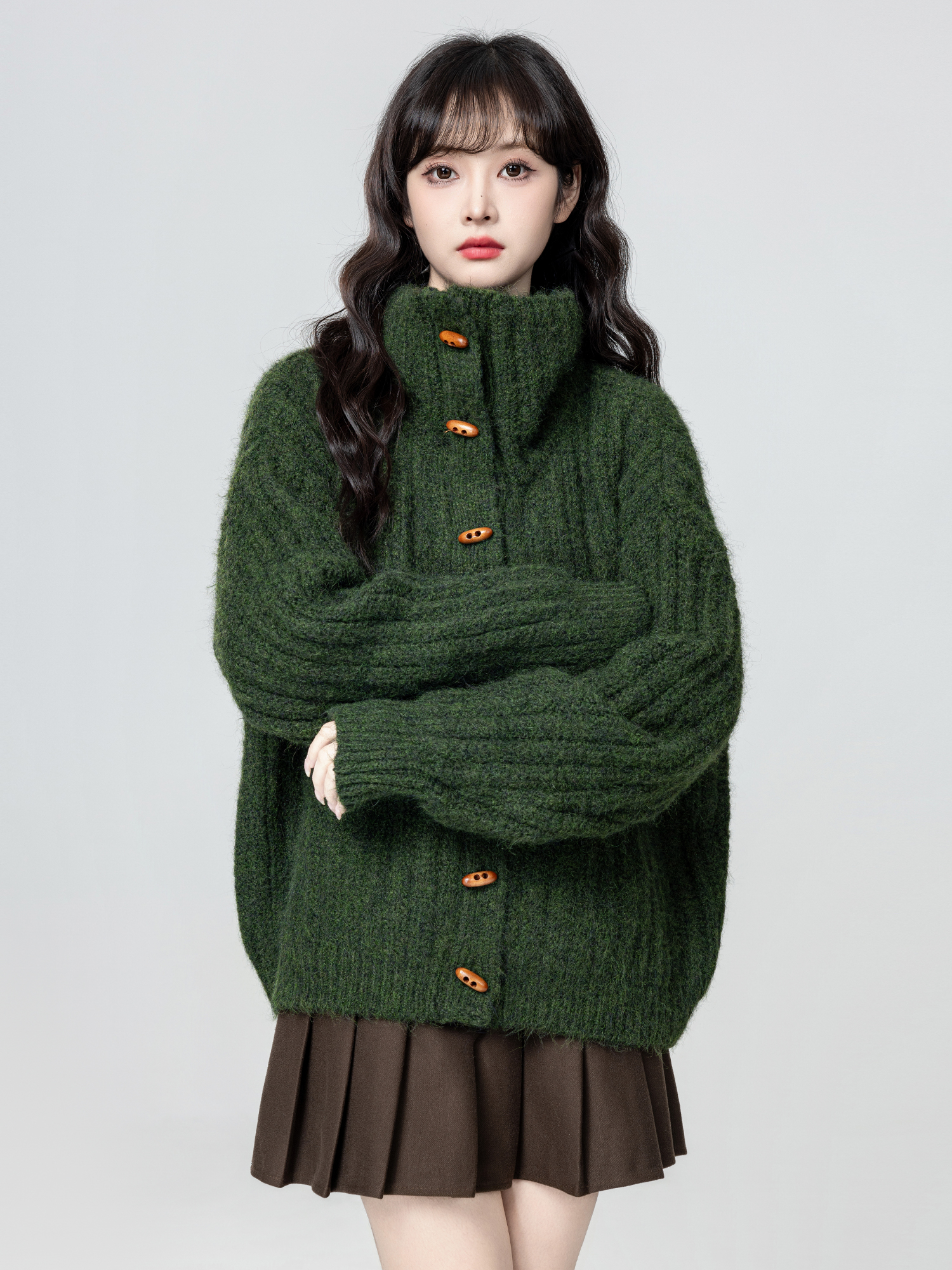 绿色高领毛衣外套女款秋冬2025冬季新款保暖加厚立领针织开衫上衣