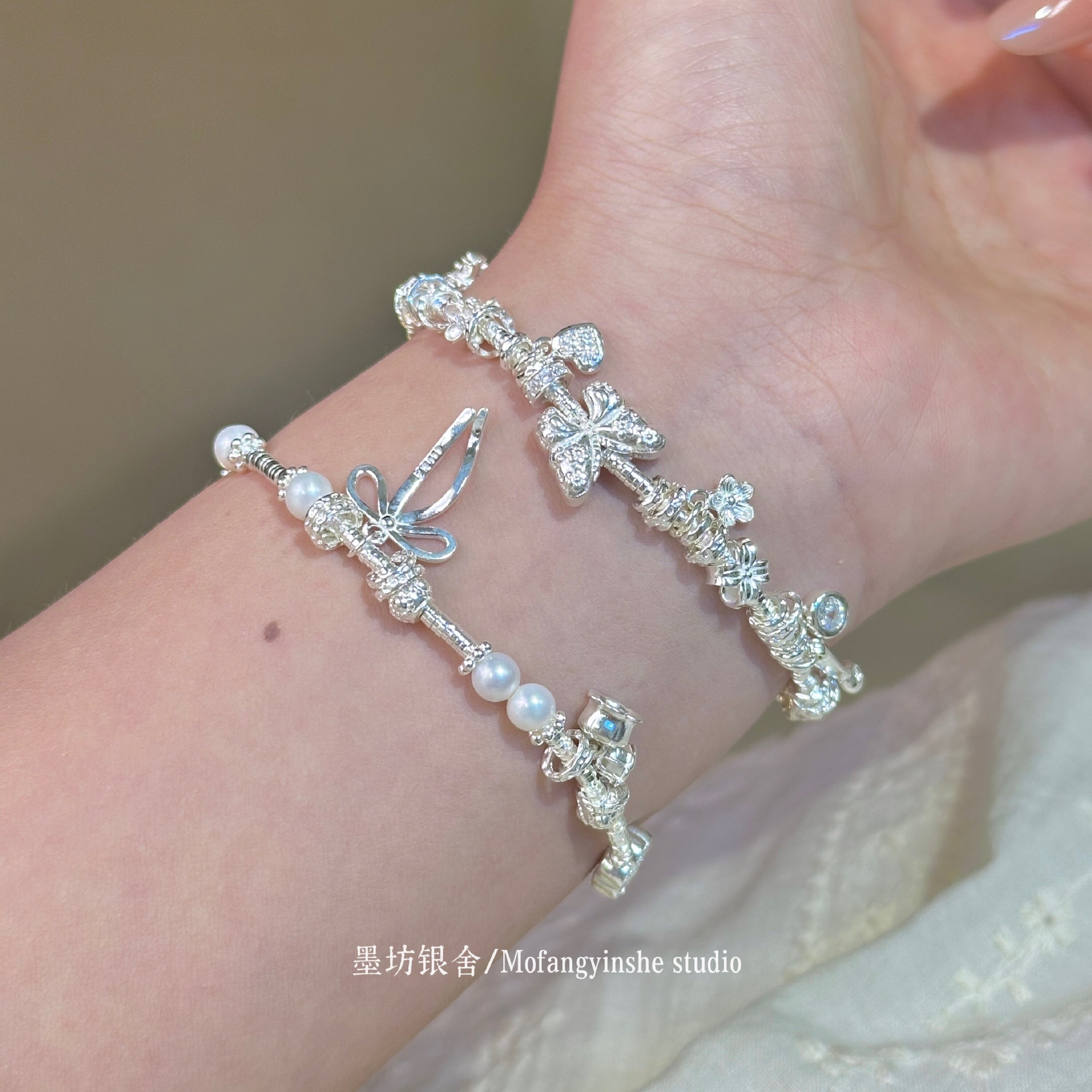 足银999铃兰花蝴蝶纯银盘缠手链
