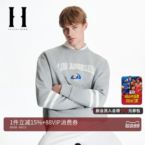 袖部条纹拼接，背部底摆贴布装饰