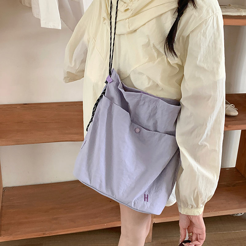 慵懒松弛感帆布包包女式2025新款夏季单肩斜挎包大容量通勤托特包