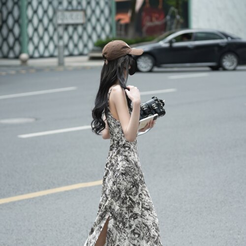 碎花无袖吊带连衣裙女a字裙2025春季新款修身显瘦开叉性感长裙子
