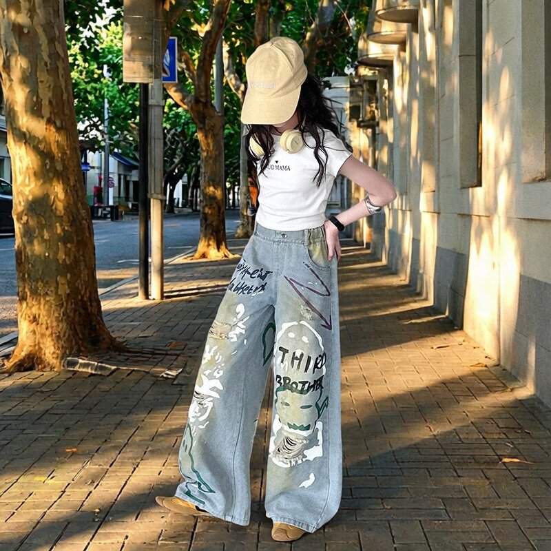 女童美式涂鸦牛仔裤春夏季2026新款大儿童潮酷复古破洞高腰长裤子
