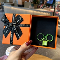 Электронная зеленая оранжевая подарочная коробка