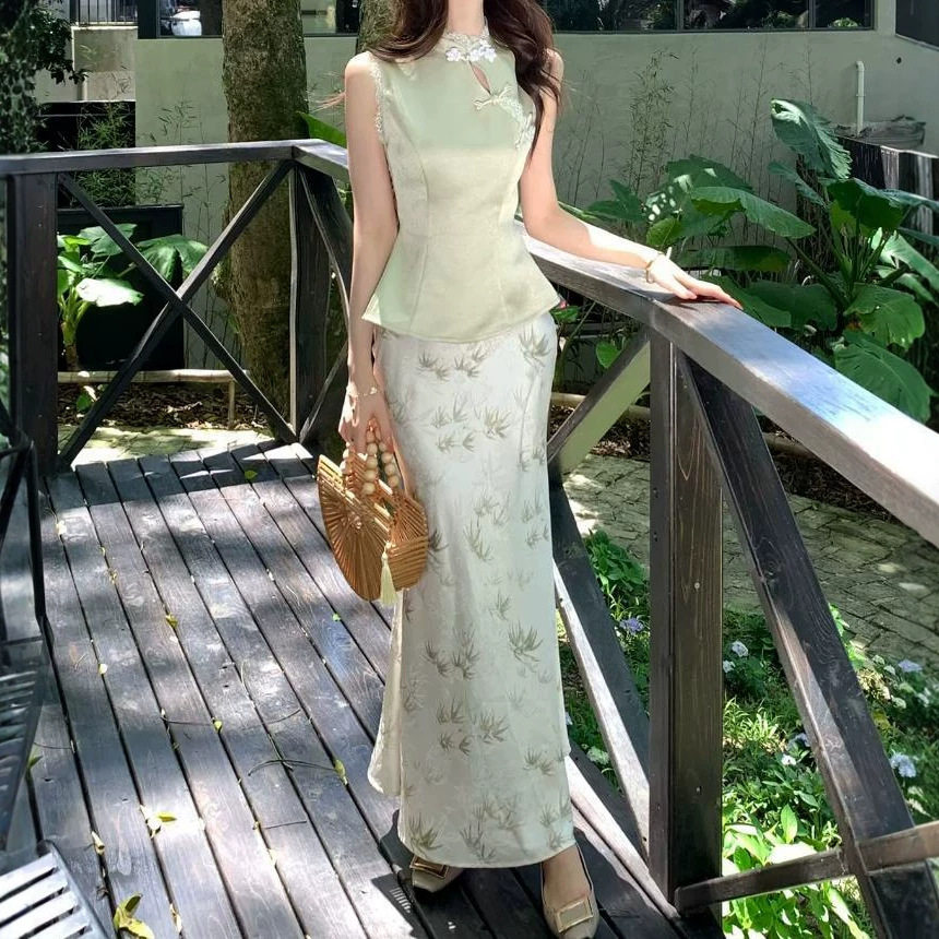 木子李的李新中式蕾丝镶边无袖立领盘扣上衣印花半身裙缎面套装女