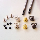 Мобильный телефон, дырокол с грибочками-гвоздиками, браслет, защита при падении