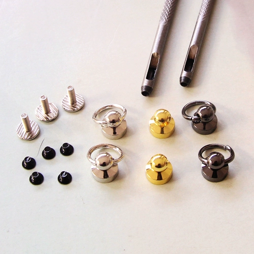 Мобильный телефон, дырокол с грибочками-гвоздиками, браслет, защита при падении