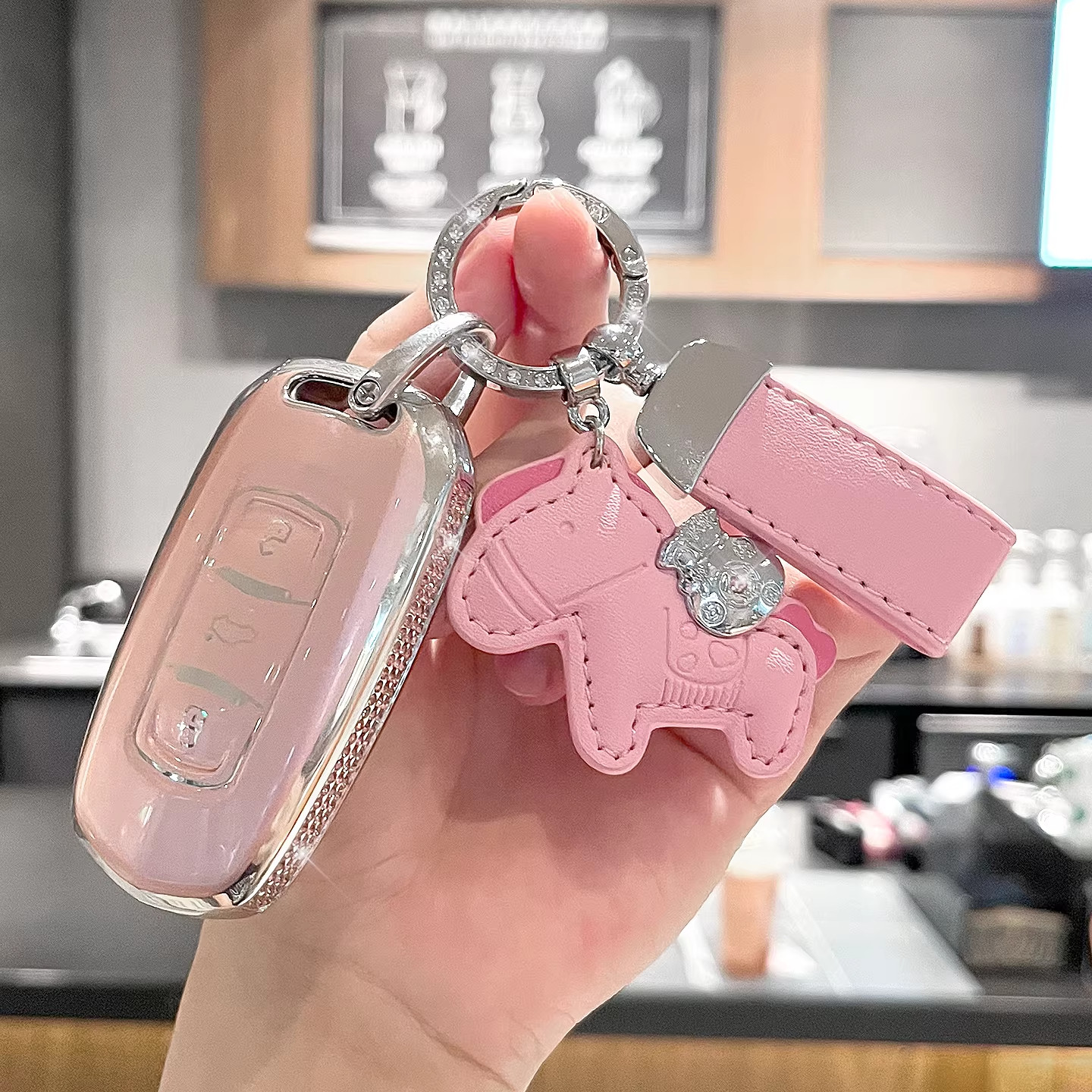 适用吉利星瑞钥匙套熊猫mini博越豪越gs星越l帝豪几何e缤越女镶钻