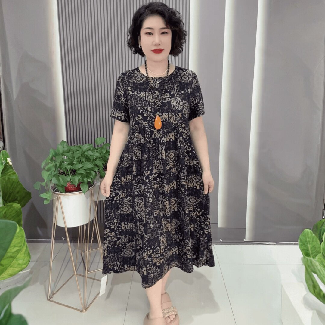 中老年妈妈夏装舒适棉麻洋气大码长款遮肚子200斤加肥碎花连衣裙