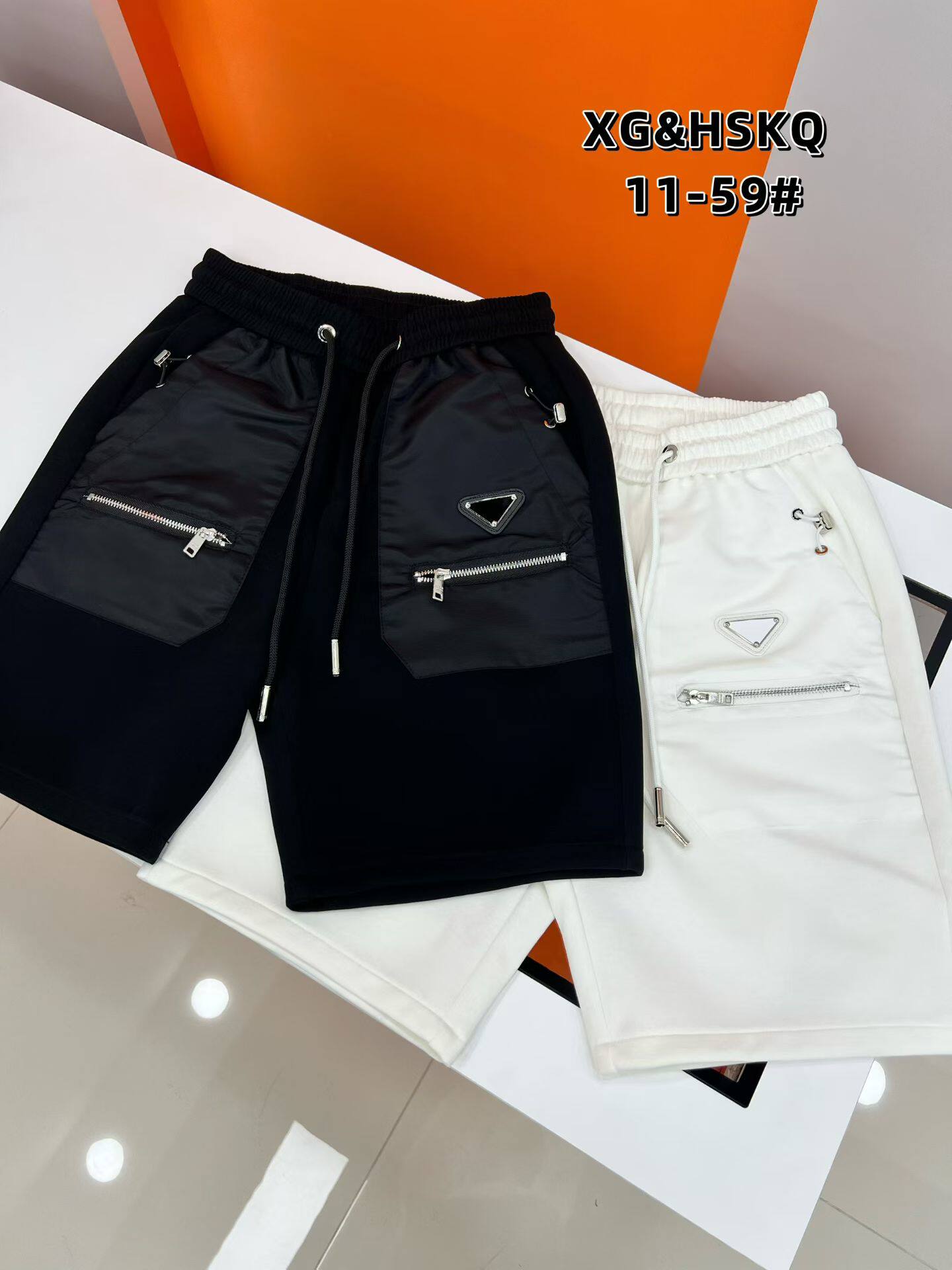 夏季新款男士欧货短裤男装时尚纯色青年五分裤拉链沙滩裤子男中裤