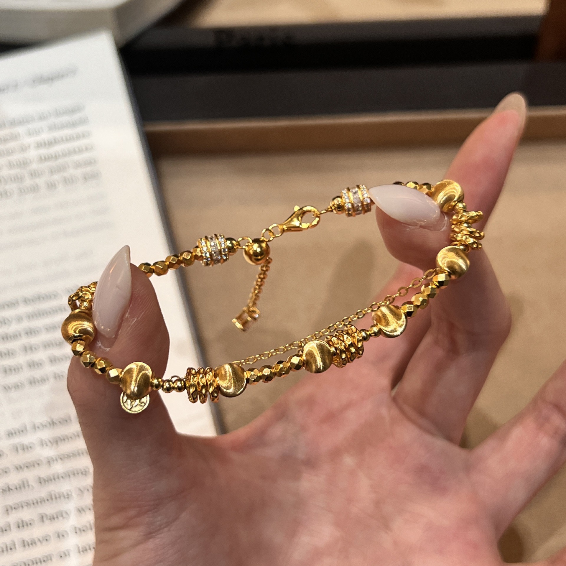 SSJEWELRY轻奢珠宝S925银镀金猫眼盘缠手链马上有钱流苏个性手饰