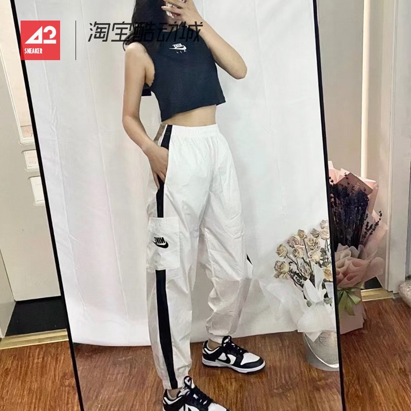 42运动家 Nike耐克 女子黑白梭织速干跑步束脚运动长裤CJ7347-100