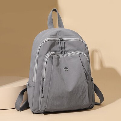 新款休闲百搭上学旅行轻便大容量多口袋牛津尼龙布防水男女双肩包