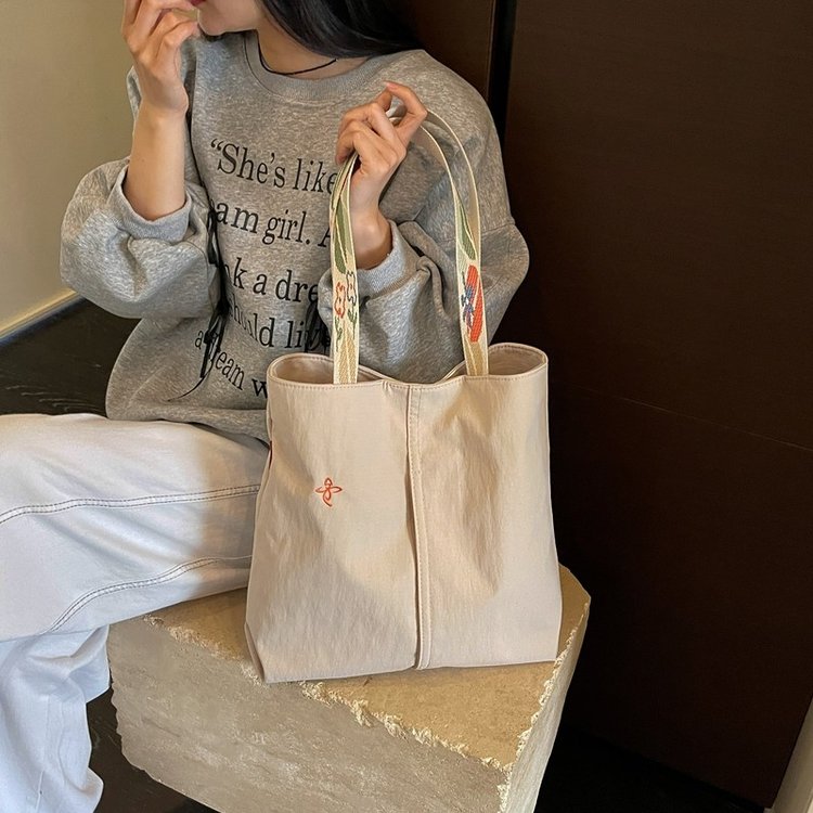 2026新款韩版帆布包包女包百搭大容量通勤学生简约腋下单肩托特包图片