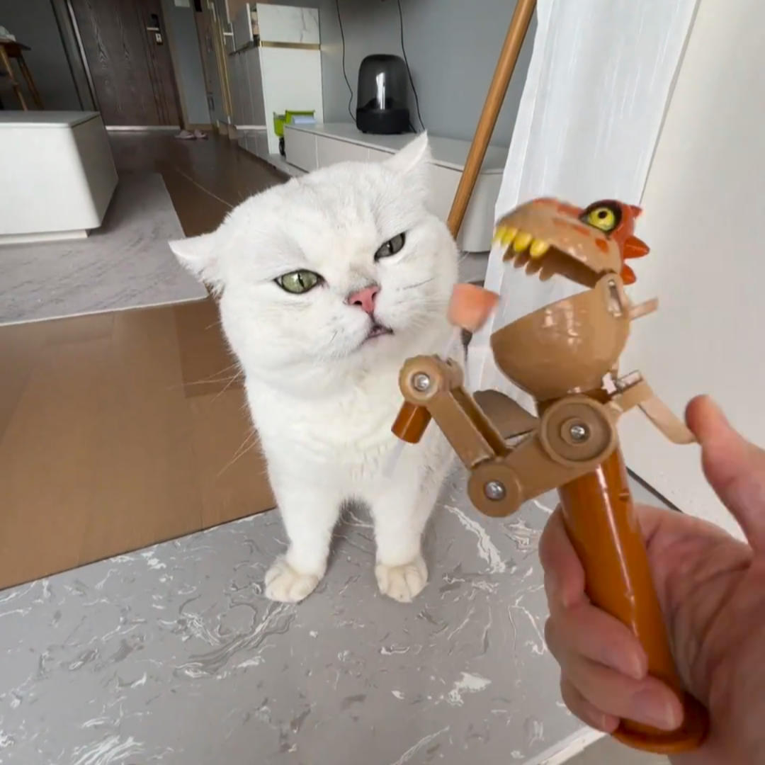 大嘴恐龙机器狗狗棒棒糖投食训练益智糖果玩具猫咪薄荷冻干发射器