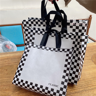 黑白格无纺布防水ins免税店高档覆膜购物袋服装袋打包出行手提袋