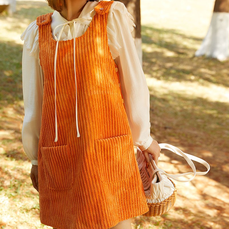 法式甜美A字裙灯芯绒纯色扣子