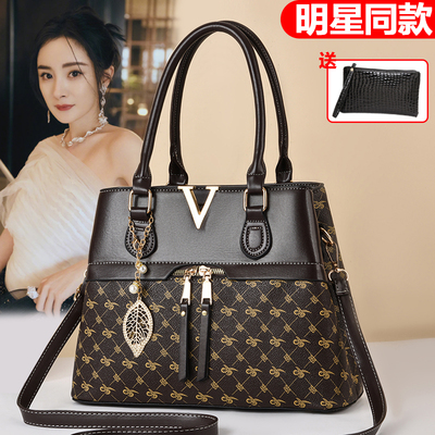 真皮质感手提包印花女包