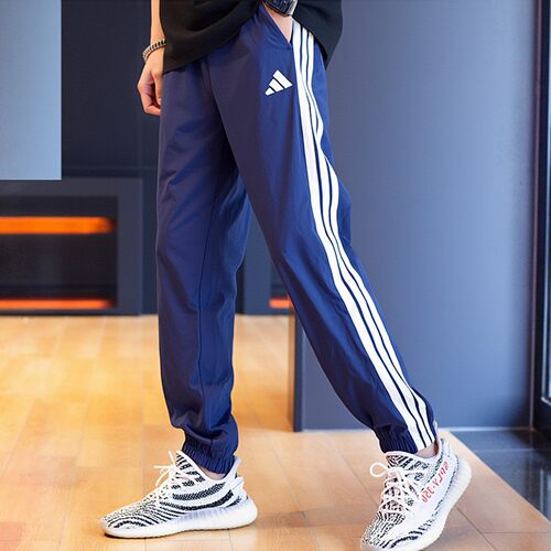 阿迪达斯蓝色裤子男春新款梭织透气长裤薄款运动速干三条纹束脚裤