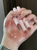 春日上新 酵色固体唇蜜558白开水裸杏色559低饱和茶粉色镜面口红