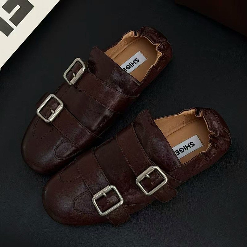 诗歌兰真皮女鞋2026早春新款英伦风平底圆头搭扣一脚蹬布洛克单鞋