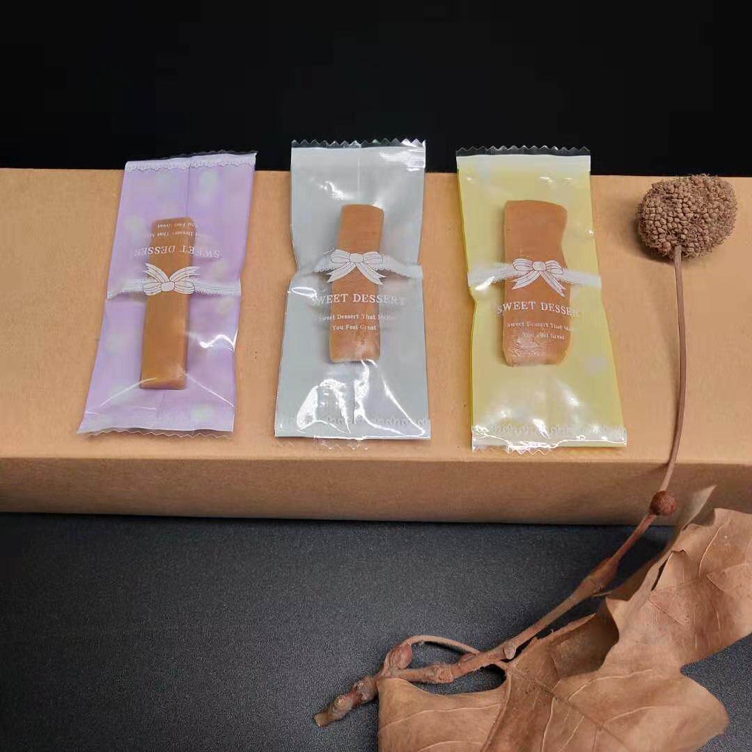 台湾进口 牛轧糖包装袋 蝴蝶结100张三色可选 尺寸9.5*4cm