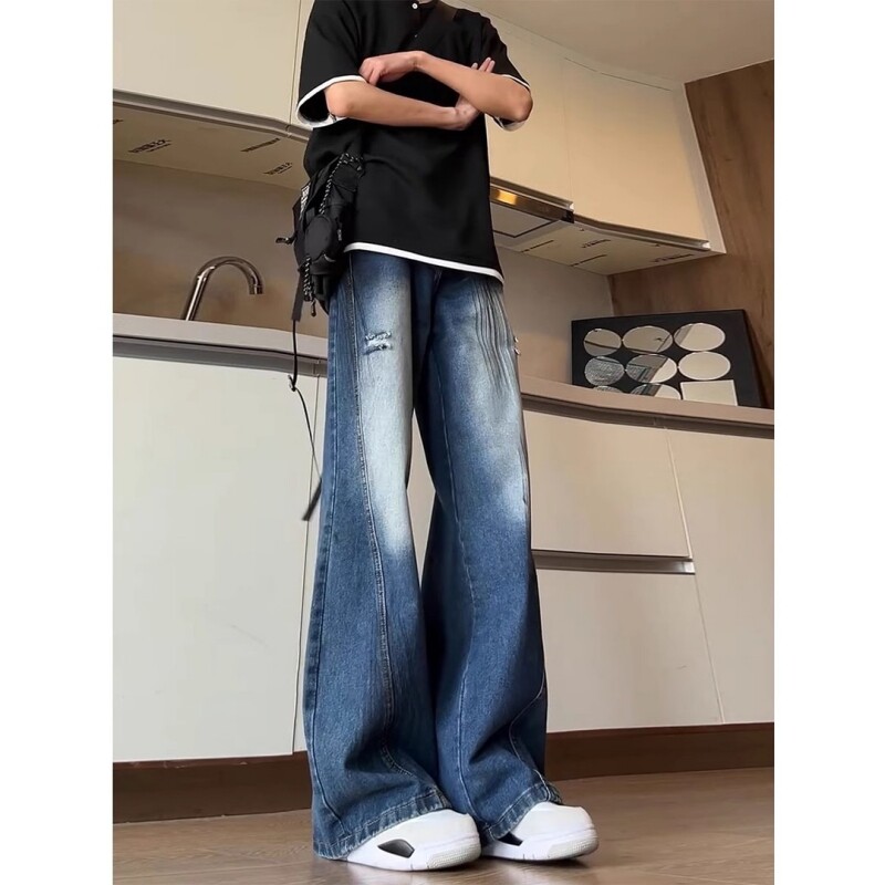 深蓝色微喇破洞牛仔裤男款图片