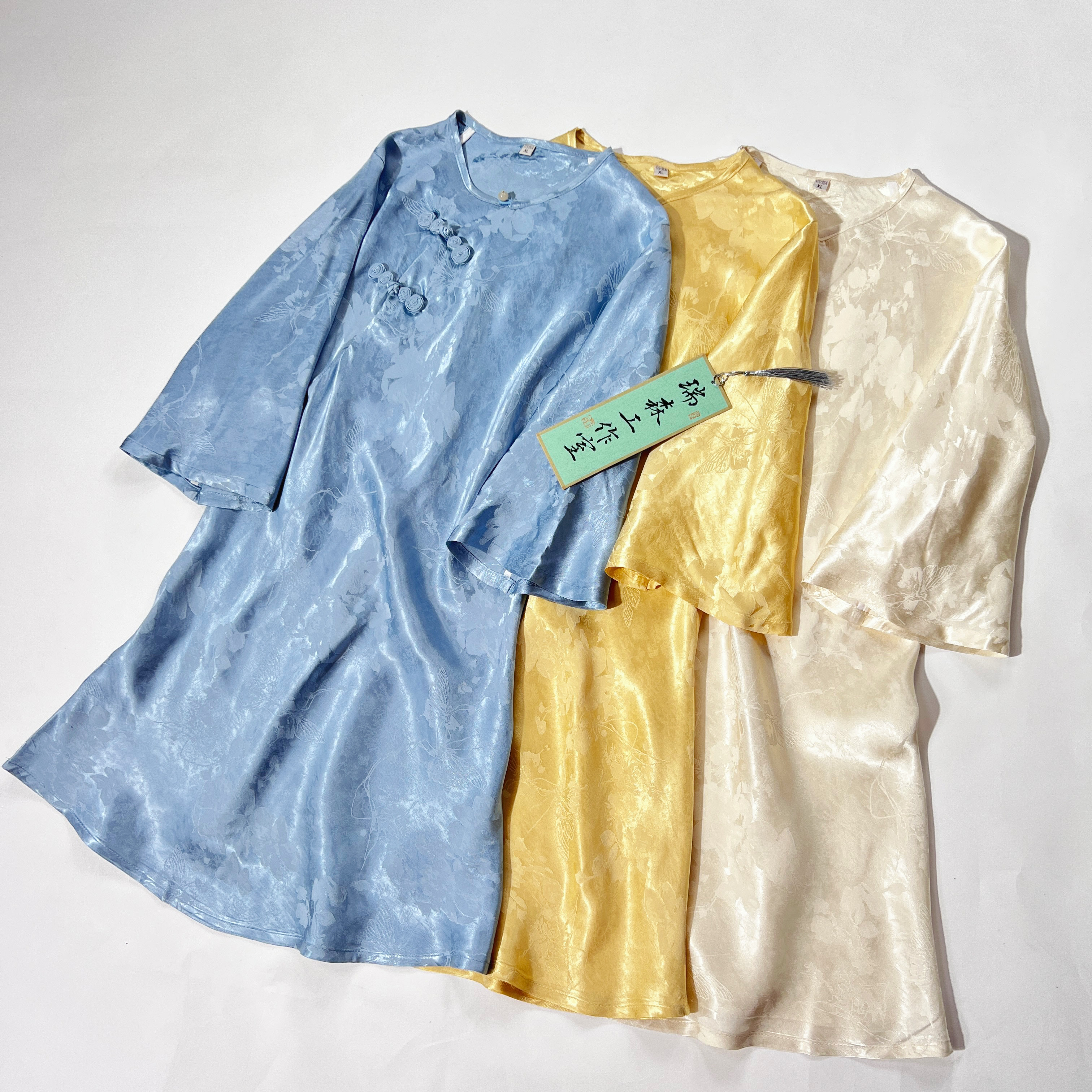 1019 美人鱼 斜裁纯色圆领璎珞款茶服上衣