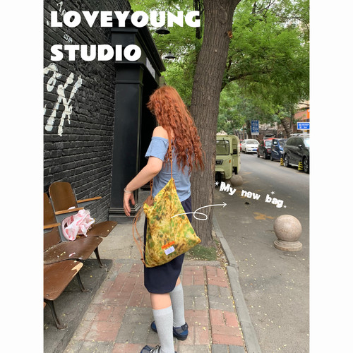 loveyoung原创“青苔”旅游度假感随性慵懒风编织肩带复古包包