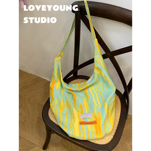 loveyoung 小眾清新薄荷曼波斜挎慵懶風(fēng)餃子包 野蠻生長 原創(chuàng)