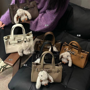 康泰娜品牌女包2026新款荔枝纹牛皮手提斜挎包大容量高级轻奢百搭