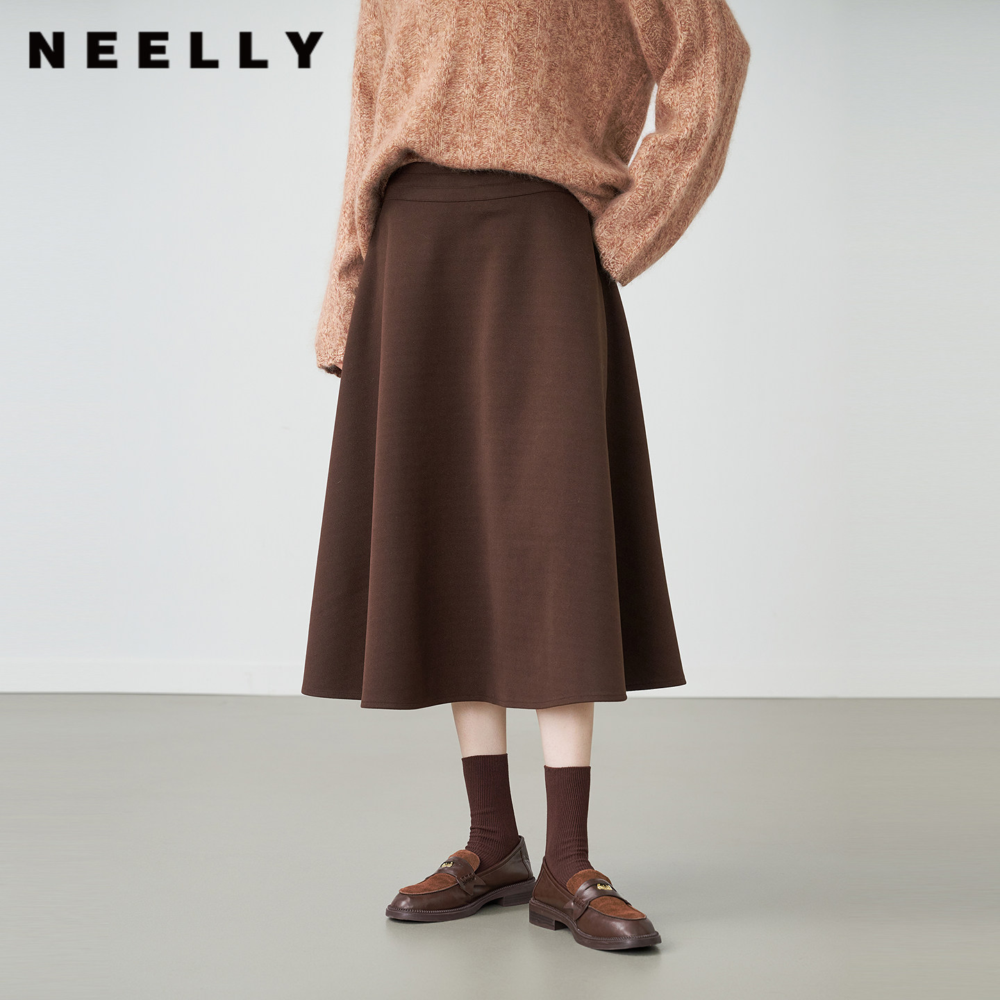 NEELLY纳俪商场同款冬新款优雅文艺松弛感半身裙女复古百搭A字裙