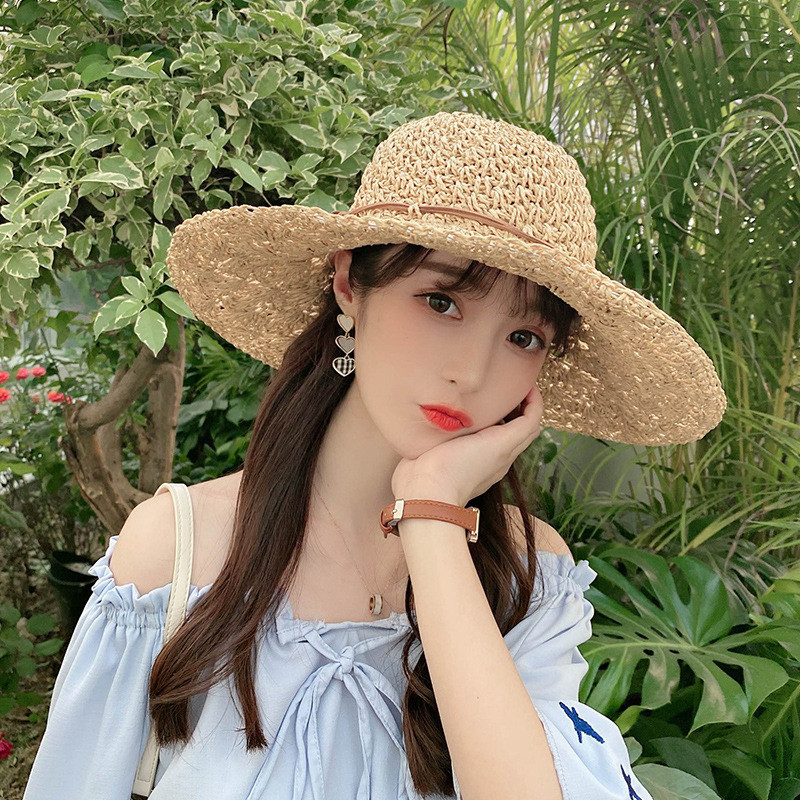 春夏时尚休闲手编镂空花朵纸绳圆顶大檐草帽户外防晒遮阳草帽女士