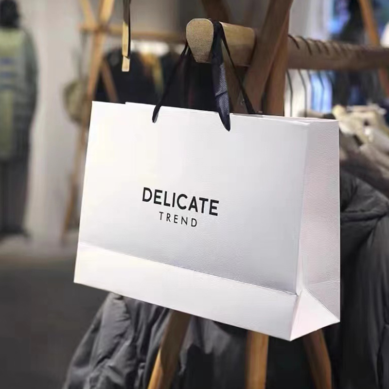 服装店装衣服手提袋纸袋定制logo女装购物袋子订制男装牛皮纸包装