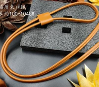 Коричневый пучок рта веревка светло -золотисто -голова