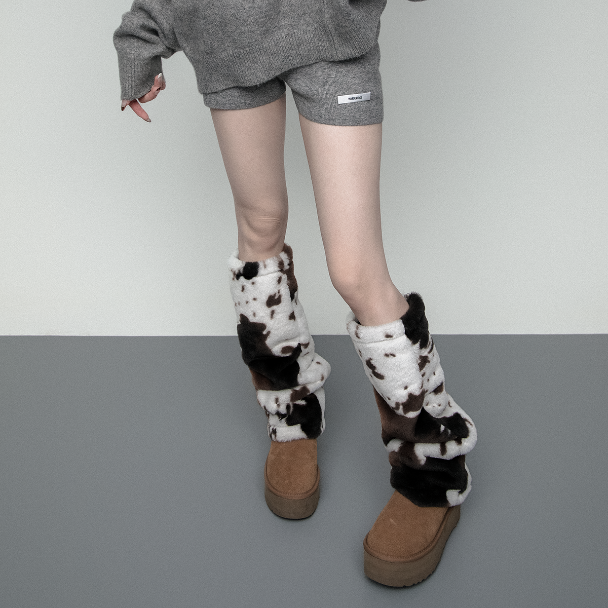 秋冬毛绒奶牛纹加厚保暖腿套女