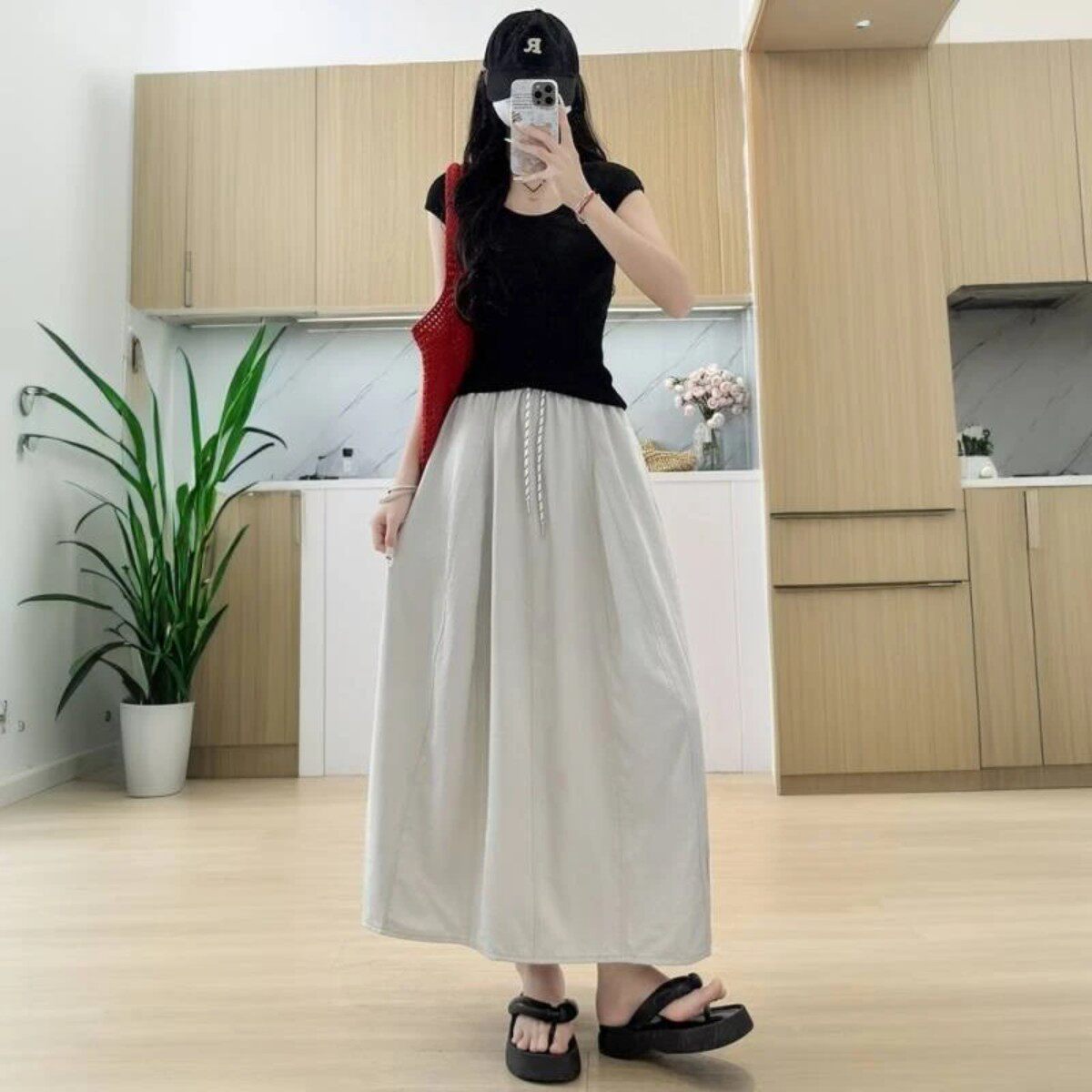 尹妃瑄小陶简约南瓜裙女2026新款少女风中长款a字高腰花苞半身裙