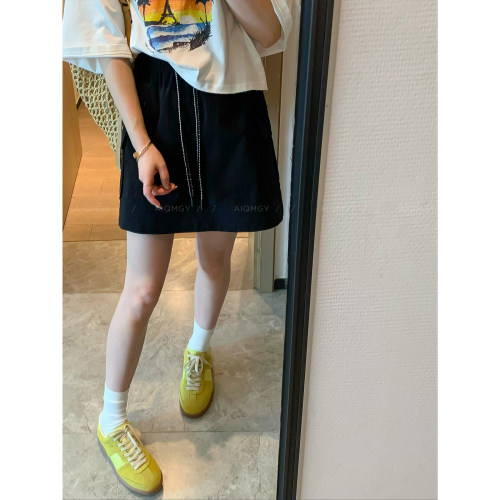 爱情魔鬼鱼 黑色松紧腰工装半身裙女2026夏季新款高腰气质A字短裙