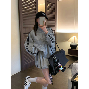 爱情魔鬼鱼 休闲运动套装女2026春季新款宽松外套花苞短裙两件套