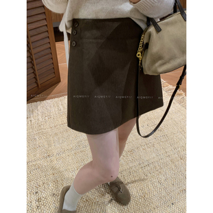 爱情魔鬼鱼 咖色简约高腰半身裙女2026秋季新款气质显瘦A字裙短裙