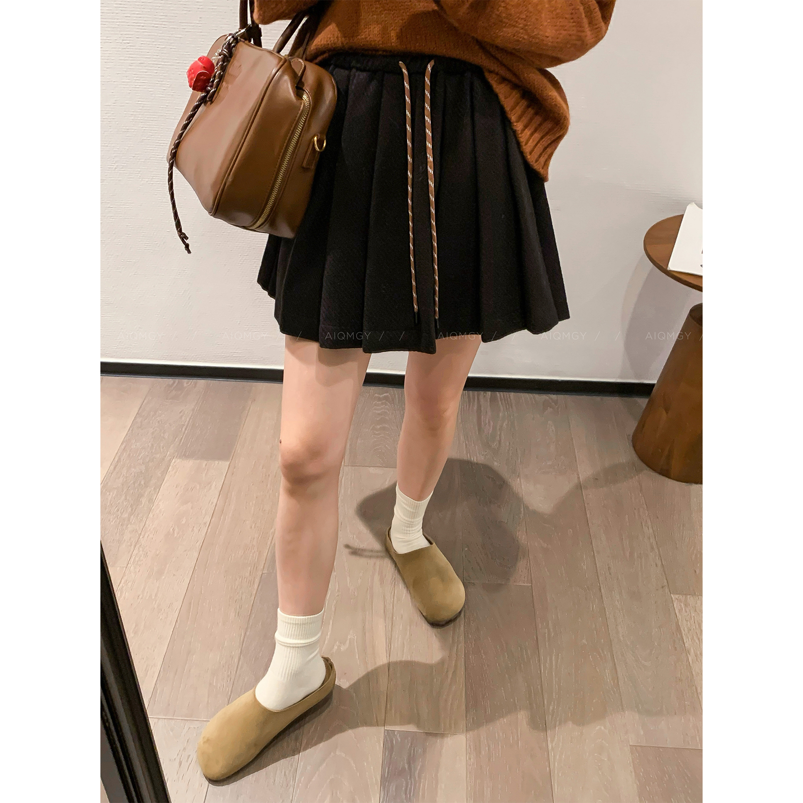 爱情魔鬼鱼 黑色时尚抽绳毛呢半身裙女2025秋冬新款百褶裙短裙子