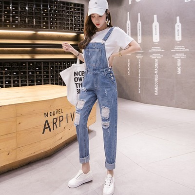 减龄破洞牛仔背带裤女九分连体裤