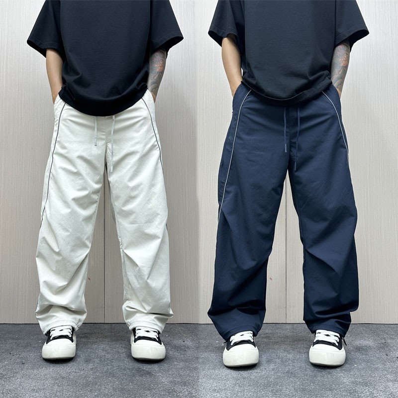设计感藏蓝色条纹拼接休闲裤