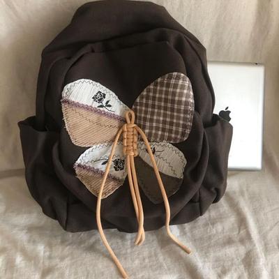 2025新款复古格纹双肩包小众设计撞色蝴蝶结帆布包学生上课通勤包