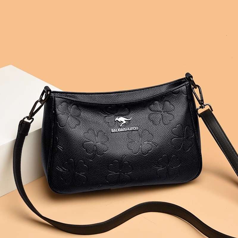 香港新款潮时尚中年斜挎包高级感压花软皮女士单肩包真皮妈妈包包