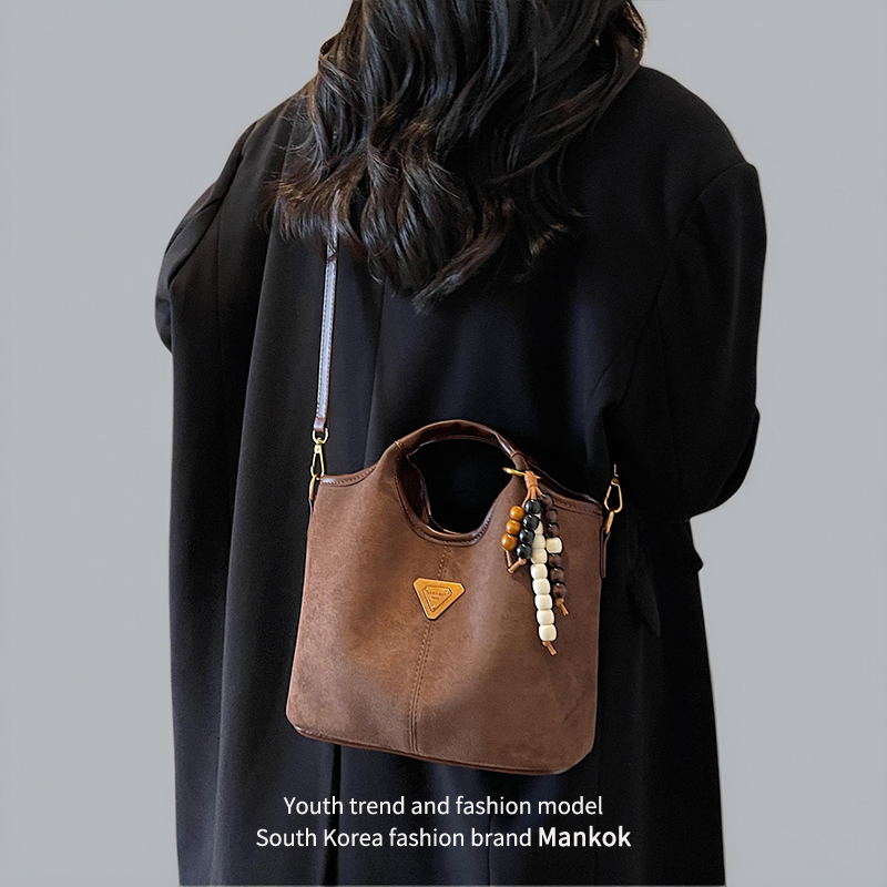 Mankok高级感小众水桶包女式2025新款潮时尚手提包通勤单肩斜挎包