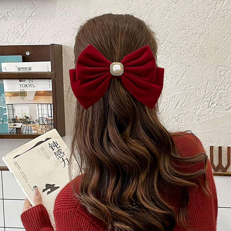 轻奢气质风植绒蝴蝶结弹簧夹