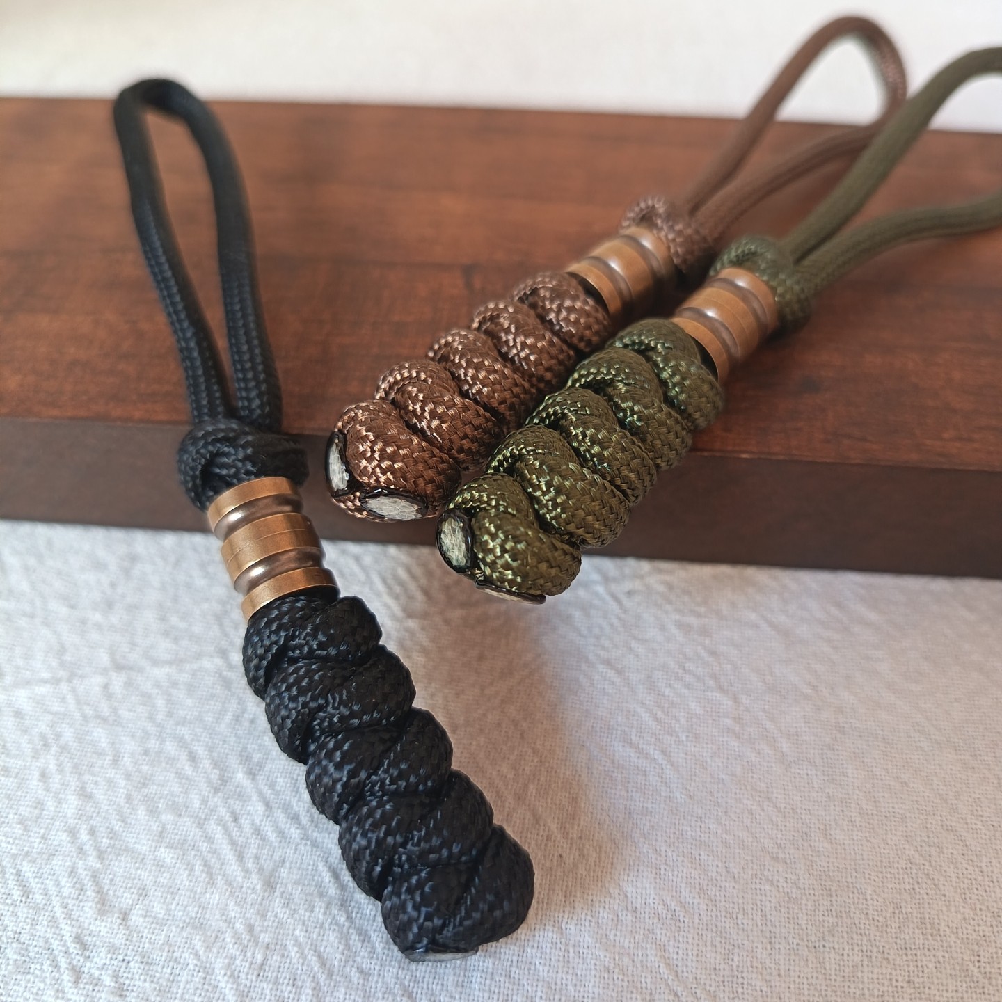 高级感户外黄铜编织伞绳挂件车钥匙扣装饰包包挂件防丢盗刀坠挂饰,服饰配件/皮带/帽子/围巾,钥匙扣,淘宝优惠券,粉丝福利购,淘宝优惠卷