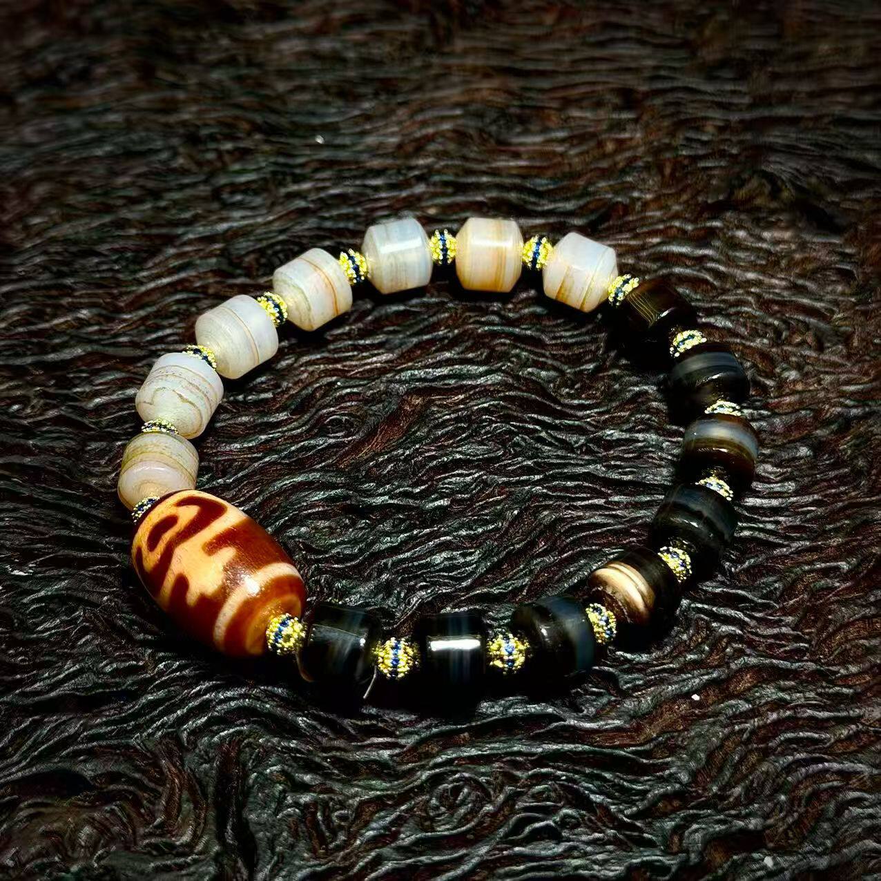 5A级天然西藏真品老矿原石玛瑙红肉宝瓶莲心天珠手串13*28mm左右