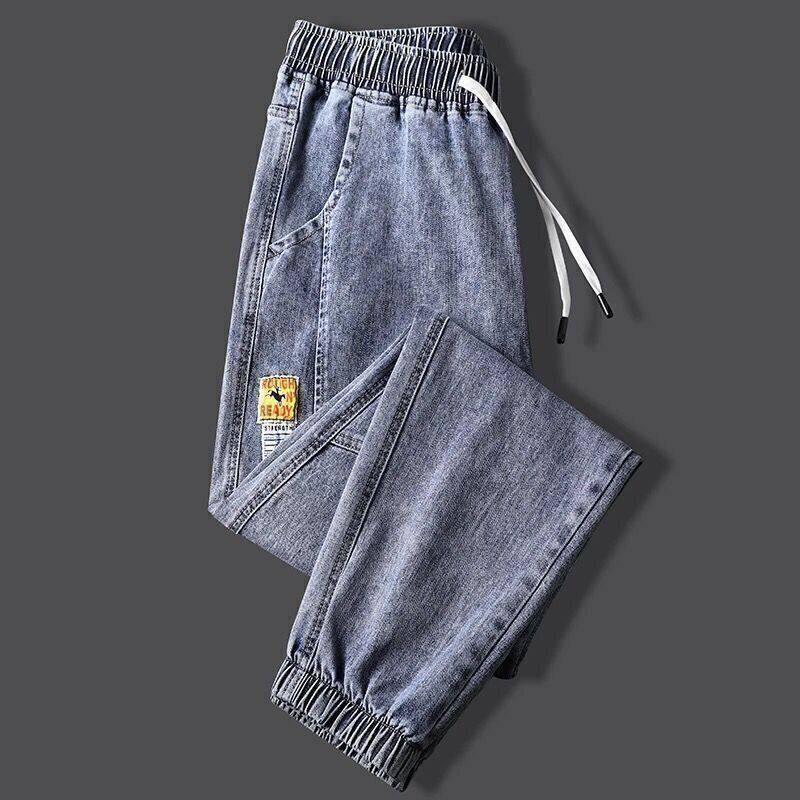 春款牛仔裤男士2026春秋新款松紧腰束脚裤潮牌痞帅抽绳休闲长裤子